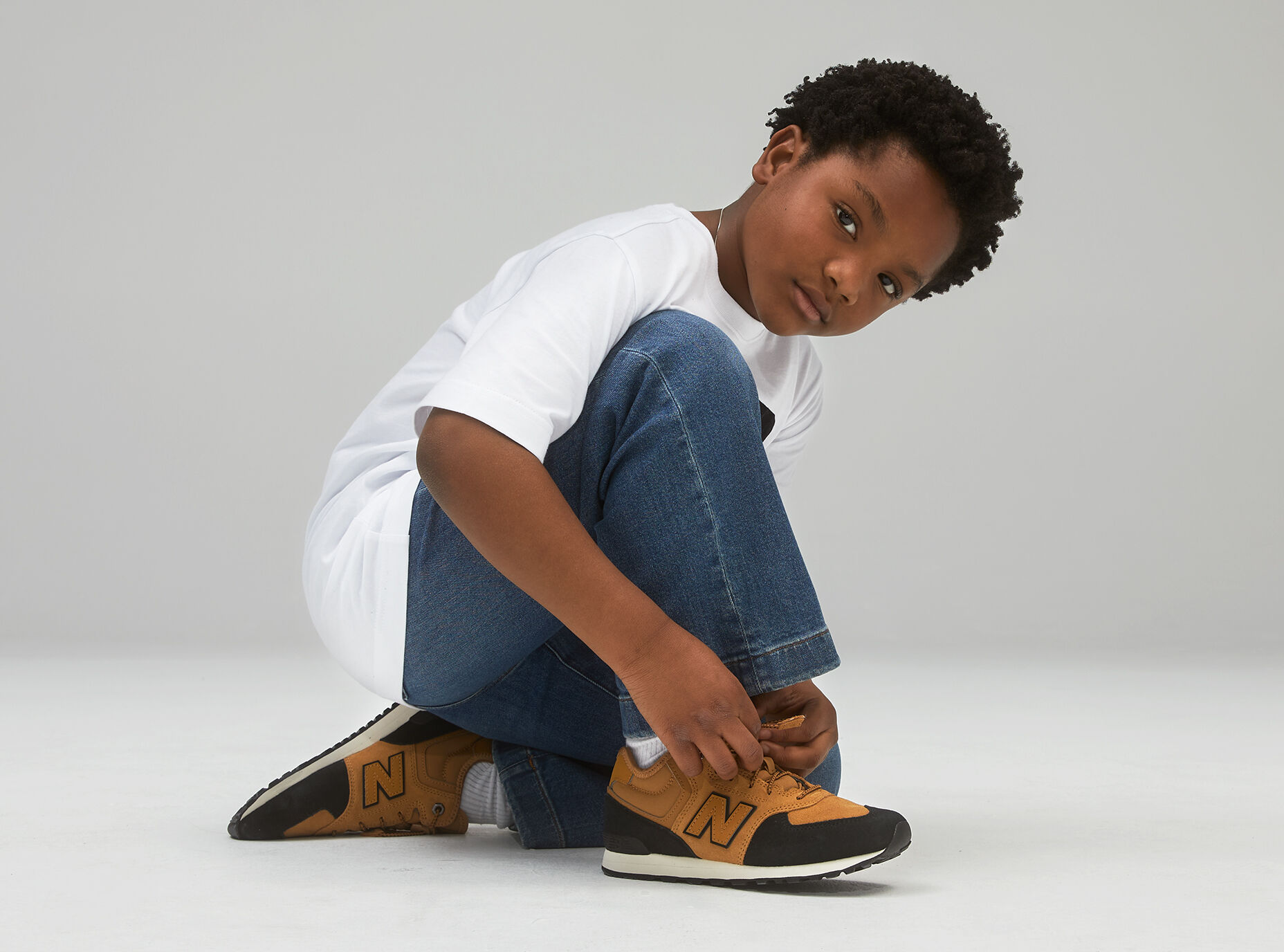 new balance youth trainers